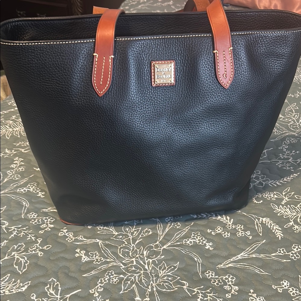 Dooney & Bourke Black and Tan Tote Bag with Leather Trim.